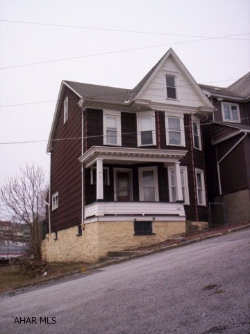 Centrally located property, with a lot of potential. Original Iron Railing for Stairway and Original Light fixtures.