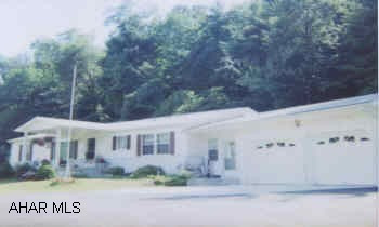 SECLUDED ONE STORY HOME ON 4 ACRES! 3 BEDROOMS, 2 1/2 BATHS, FAMILY ROOM, COVERED DECK, 2-CAR GARAGE PLUS CARPORT, CENTRAL AIR AND MORE. SECLUDED ONE STORY HOME ON 4 ACRES! 3 BEDROOMS, 2 1/2 BATHS, FAMILY ROOM, COVERED DECK, 2-CAR GARAGE PLUS CARPORT, CENTRAL AIR AND MORE. DIR: OLD RT. 22 PAST CHUCK WAGON, TURN LEFT.