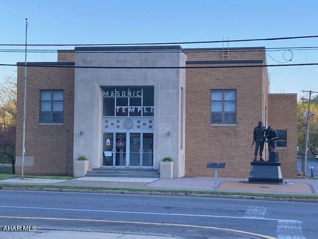 So many possibilities for this building! 13,240 sqft in total with 9,120 rentable space. Currently an event center on the main floor with a 21x19 kitchen, 14x20 stage and a 47x78 banquet room. Lots of storage, private and public restroorms on first floor with a separate bar area. Second floor is currently a large meeting room, offices and more. Ample parking for events. Let your imagination go with this gem.