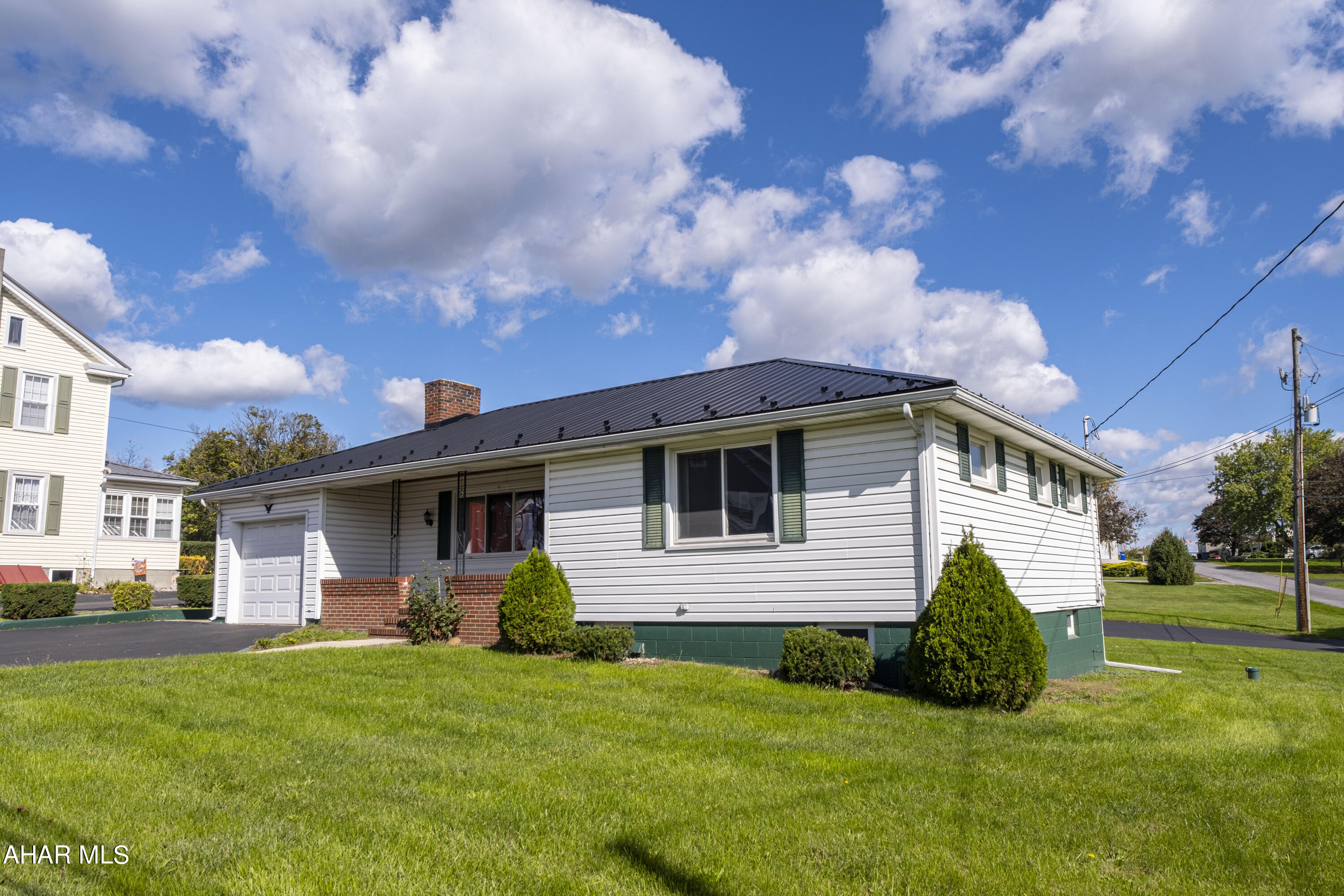 Welcome to this one story ranch home with an attached garage . This home features a galley kitchen, dining room a spacious living room and 2 large bedrooms, a partially finished basement with a bath room and large bonus room. But wait, there is another home with opportunities to suit your needs. This fully updated home features 3 nice size bedrooms, 1.5 baths, laundry, living room and kitchen . Also, a 3 car garage underneath.Don't miss out on this . Schedule your tour today.