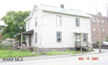 Bank Repo. Sold "AS IS". Call agent for addendums before submitting offer.