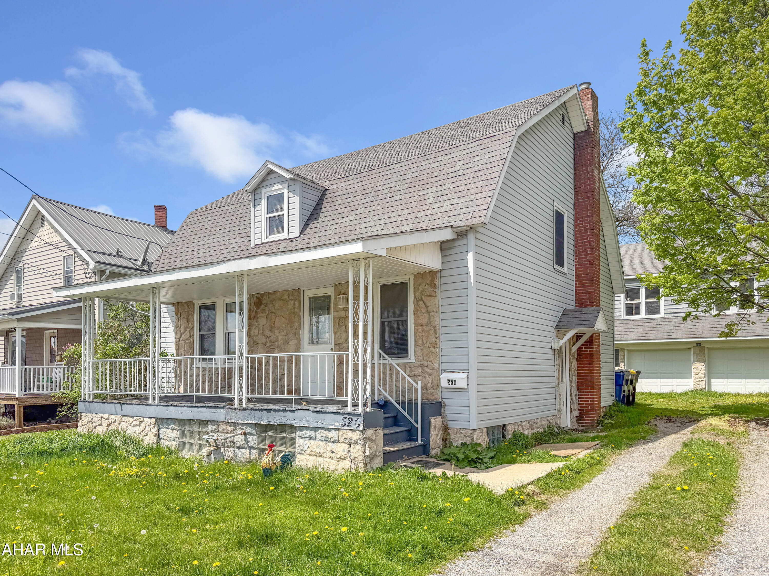 Welcome to 520 W Ogle Street in the Ebensburg Borough! This charming Cape Cod offers a rare opportunity with a potential second dwelling or workshop, ideally located directly across from the ball field and playground, and just a short walk to the Ghost Town Trail. With a little TLC, this could be an incredible property. The main level features a spacious foyer, a large sun-filled living room, formal dining area, and a cozy kitchen with classic oak cabinetry. Upstairs, you'll find two comfortably sized bedrooms and a full bathroom. The basement is unfinished but provides excellent storage space and includes laundry. Outside, enjoy a covered front porch, off-street parking, and a large private yard. A standout feature is the detached 2-car garage with a potential apartment above, offering excellent possibilities for additional income, guest space, or a workshop. The upper unit will require a new sewer line and heating system to be fully functional. Don't miss this versatile property in a prime in-town location. Call today to schedule your private tour!