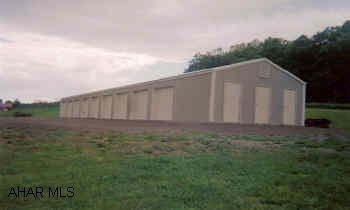 12 storage units on 1.82 acres.  Door openings for the 10'x20' units are 8' wide and 7' high, openings for 6'x10' units are 3'4" wide and 6'8" high Rentals: 10'x20' - $55/mo., 6'x10' - $30/mo.
