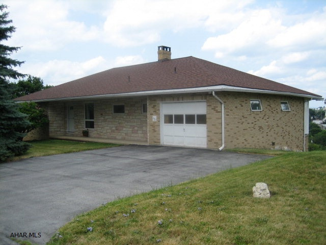 3 bedroom - updated baths - Open concept Living Room, dining room, hickory hardwood floor, fireplace. Million dollar view. Garage can hold your RV..Move in condition..