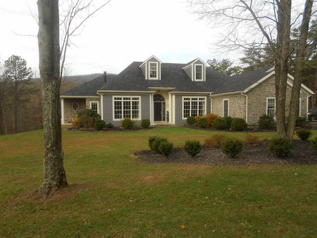 Executive custom built ranch home on 2 private acres.  (28 additional acres are available, MLS #45389, North River Lane).  Upon entry, it is obvious that this is not your ordinary home. Designer touches like tray ceilings  and a great room with floor to ceiling stone fireplace wall flanked by French doors on either side are stunning.  Over 20 feet of granite countertops surrounds the open concept custom built kitchen. Two first floor master suites offer gorgeous marble bathrooms.  The finished lower level includes another master suite with marble bathroom, home theatre, game room and cherry bar.  Too many extra to list must see property!
