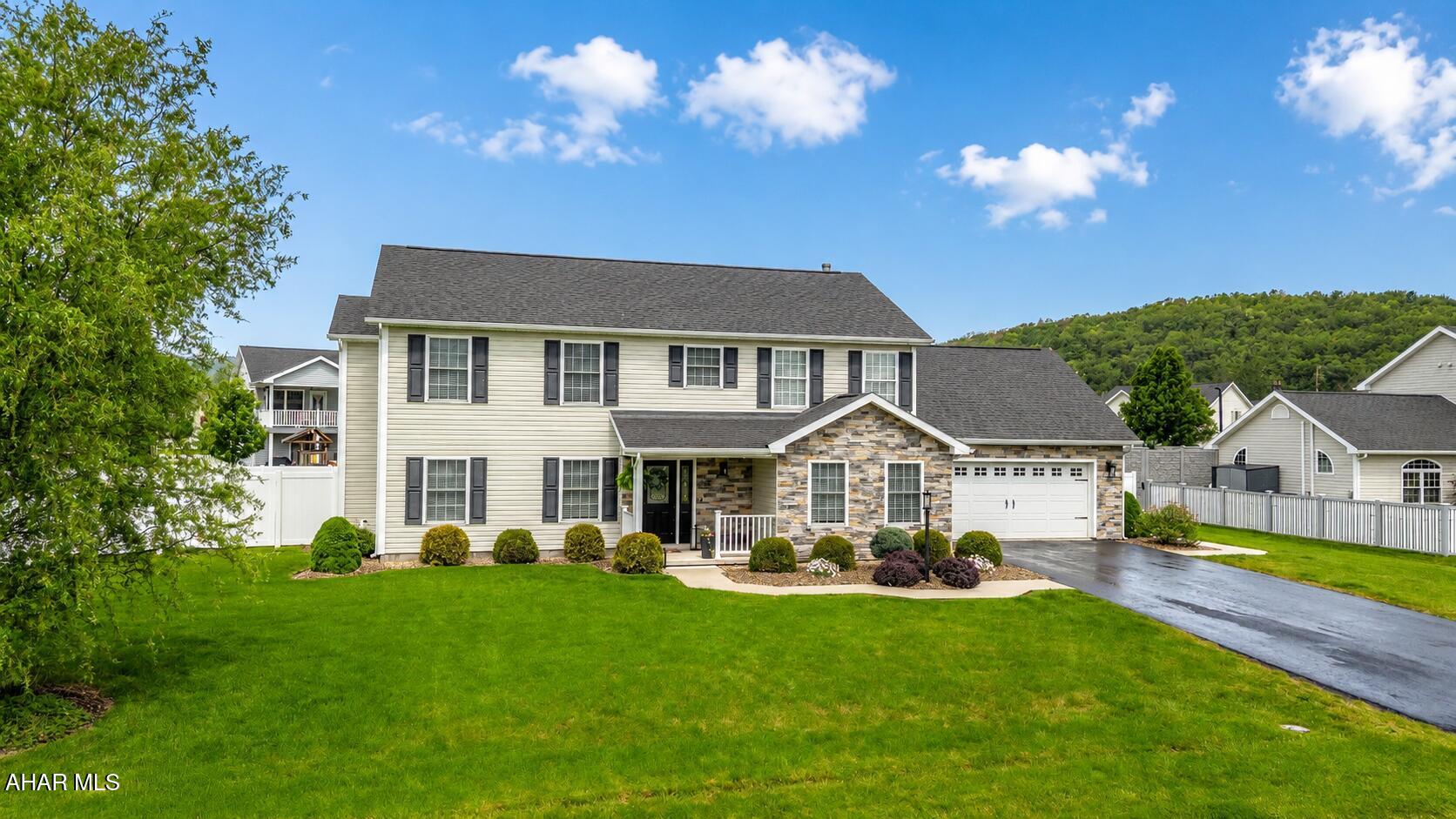 Welcome home to 126 Mallard Lane!

This stunning, move-in ready, spacious, low-maintenance home is everything you've been waiting for. Nestled in a quiet, welcoming neighborhood just outside of town, this property offers the perfect blend of peaceful rural charm and neighborhood convenience.

Featuring 4 spacious bedrooms, 2.5 bathrooms, and an expansive finished bonus room above the garage, this home offers endless possibilities -- use it as a 5th bedroom, home office, gym, playroom, or additional storage space to fit your needs.

Designed with both style and comfort in mind, the interior showcases elegant quartz countertops, luxury vinyl flooring, updated lighting fixtures, beautifully tiled bathrooms, and plush carpeting throughout the upstairs. Thoughtful features such as a central vacuum system, laundry chute, spacious closets, and abundant storage -- including under-stair storage, a 2-car garage, and outdoor shed -- make everyday living both functional and convenient.

The thoughtfully designed layout creates an ideal balance of openness and practicality, with spaces flowing effortlessly from one room to the next. Start your mornings in the screened sunroom, the perfect spot to enjoy a cup of coffee and the refreshing breeze. Step outside to a backyard designed for relaxation and entertaining, complete with a patio and firepit, large flat yard, and tall privacy fence offering comfort and seclusion.

The exterior is equally impressive with tasteful stone accents, fresh landscaping, and exterior lighting that create exceptional curb appeal.

Meticulously maintained and truly turnkey, this home needs absolutely nothing -- simply move right in and start enjoying everything it has to offer this summer.

Open House: Sunday, 5/31 | 11:30-1:30
Make plans to see this one before it's gone!