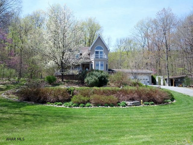 10-Acre Beautiful peaceful setting - borders State Gamelands - modern 2 story home, 3-car garage, 2 sheds and boat storage building, 2 professionally installed coy ponds, and tex-deck. GEO thermal heat and central GEO thermal air conitioning, fireplace, woodburner.  #J-251