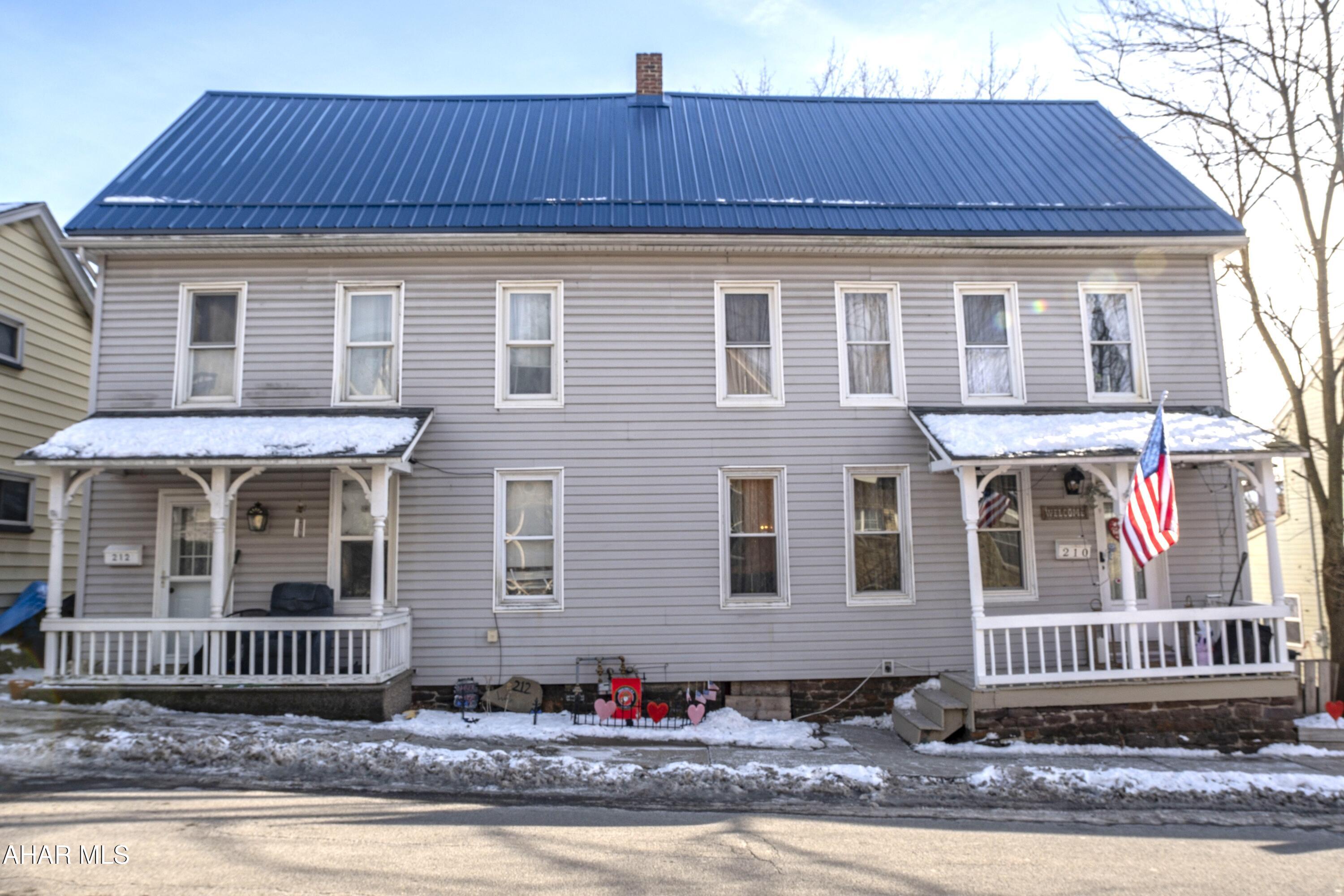 Excellent investment opportunity with this spacious two-story duplex set on approximately 0.25 acres in Hollidaysburg! Offering nearly 3,870 square feet, the property features long-term tenants and generous unit layouts. Unit 1 includes 4 bedrooms and 2 full baths, while Unit 2 offers 3 bedrooms, a captive room, and 1.5 baths. Recent improvements include a new metal roof installed in September 2025 and updated flooring in bathroom, dining room, living room, and kitchen of 210. Off street/Ample parking available behind the building and both units have separate utilites! A great addition to any investment portfolio.