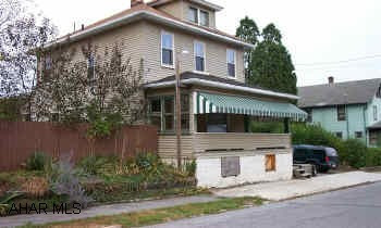 "Being Sold As Is"  2 story,  3 bedroom, 1 bath home with enclosed sunporch.  Fenced 50x85 lot, and  off street parking.  Alum/vinyl siding, shingled roof, newer windows, 100 amp breakers, new bath, needs TLC, on a  dead end street. "Being Sold As Is"  2 story, 3 bedroom, 1 bath home with enclosed sunporch.  Fenced 50x85 lot and  off street parking.  Alum/vinyl siding, shingled roof, newer windos, 100 amp breakers, new bath, needs TLC, on a dead end street.
