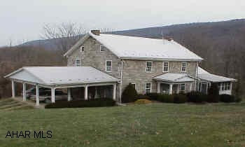 Unique opportunity to own 187 private acres.  Some wooded, some open, gently rolling & very picturesque.  Beautiful stone farmhouse with some outbuildings.  Former quarry on property.  Geological survey available showing quality limestone.  Multiple uses.  No Zoning.  Abuts Rails to Trails.  Additional river front acreage available.  Can be used as Bed & Breakfast - Horse Farm - Quarry.  Call for apt.