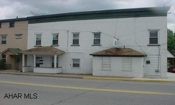 Brick - 3 unit income property. Brick-3 unit income property. Apartments - Blair Street-1 efficiency, Montgomery Street Apt. 1 - kitchen, living room, one bedroom & bath. Montgomery Street Apt. 2 - 2 bedrooms, kitchen, living room & bath.