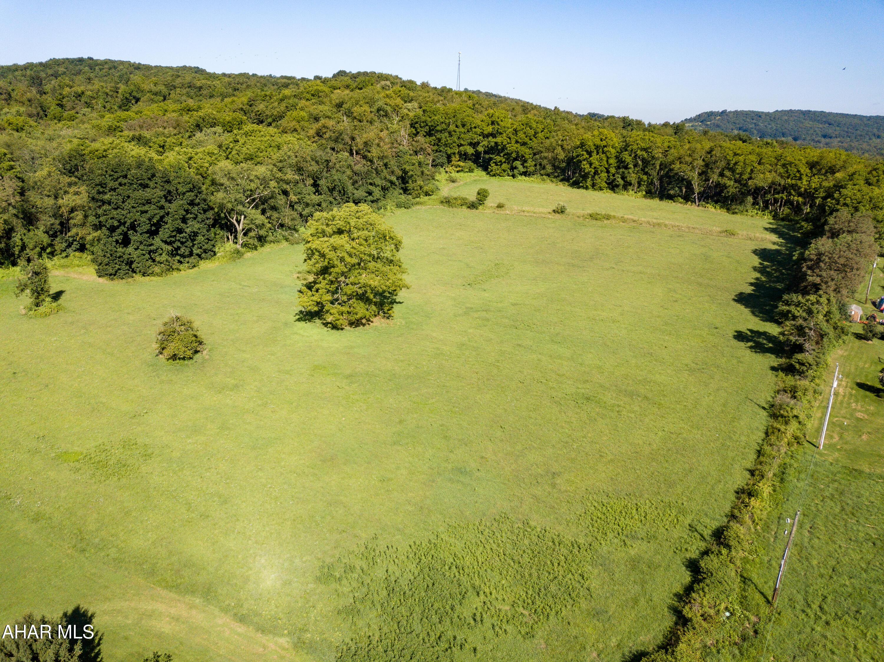 An exceptional location for various business opportunities.   This 11 acre parcel is located just off the Sunnyside Road connector to US Route 30 with easy access to I99 & PA Turnpike.  Multiple public sewer taps on site as well as a UGI gas line off Sunnyside Road.  Perfect location for an apartment complex, town homes or a variety of businesses.