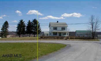 1.313 acres with house, stable, and out buildings sold for $118,000. .625 acre unimproved lot sold for $17,000.  Remodeled 2 story home on country setting close to Chestnut Ridge Schools and Shawnee State Park. Nice view from yard. Two storage bldgs. and stable. ALSO AVAILABLE FOR $125,000 WITH 1+/- acre.
