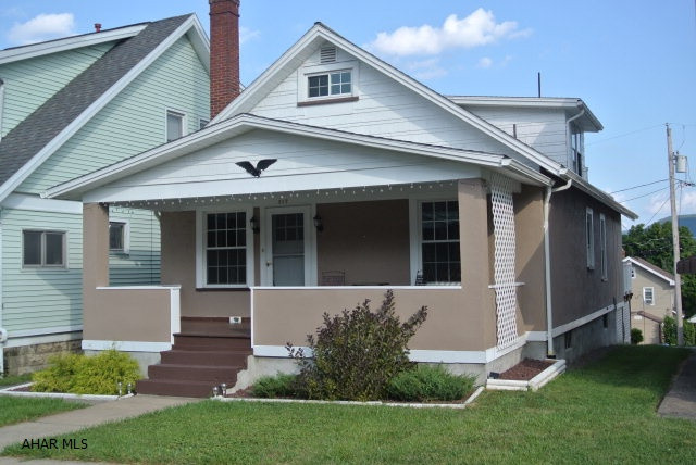 What a classy Home!   This Elegant 1 1/2 story well built solid home has the warmth and charm of some the best homes in town. Walk through this particular home you will see the detail and quality of a well built home that is nothing short of updates.   From the Hardwood floors to the Newer Oak kitchen, you get a darling a home to enjoy maintenance free for years to come.  New furnace, Central a/c, new paint ext and inte.r, new carpet in bedroom, newly remodeled bath, newer windows, new light fixtures, and newer kitchen. Basement is very clean and painted and could easily be a recreation room.   All appliances stay.   You must at least see this home.   It is 5 mins from the campus and hospital.  3rd Bedroom is Captive (must go through 1 bedroom to get to another.  Seller is related to agent