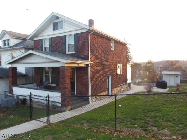 Brick Home with an addition, 2 story on a double, fenced lot with many tasteful updates like Granite countertops,  Stainless Steel appliances, New Oak Kitchen & New Baths.  It's built as a 2 BR, but possibly 3 BR on 1st floor in FR, so one floor living possible.  Some New hardwood floors, New electrical 200 amp "Square D" breakers, copper plumbing, New HE GFA with New A/C unit. One car integral garage & off street parking. Outside cement patio. Cozy living and quiet brick home.  If you don't look at this soon you may be sorry!