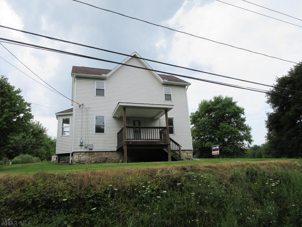 Nice 1 acre Bedford farmette in need of some TLC. Large 2 story home with beautiful eat-in kitchen with large center island, spacious living room with laminate floors, 1st floor 3/4 bath/laundry room. Large barn, older shed/outbuilding. Needs some work, but could be a real dream property. AS-IS sale. Seller will make no repairs.