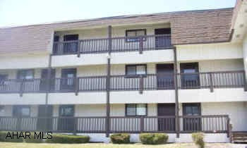 ASS'N DUES $175/MO. INCLUDES USE OF INDOOR & OUTDOOR POOL, HOT TUB, STEAM ROOM, TENNIS COURTS, TRASH, CABLE, EXT. MAINT. GOLF COURSE AVAILABLE. BRICK FIREPLACE, COVERED DECK. SALE INCLUDES ALL FURNISHINGS EXCEPT FUTON.