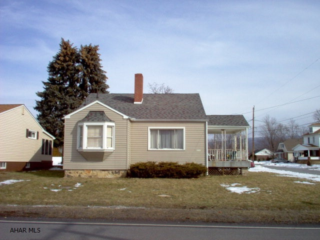 Cape Cod house in convenient location.  Vinyl sided with good basic mechanics; needs cosmetic work, could be a fantastic, easy to care for home.  Oversized garage, corner lot, newer roof over house.