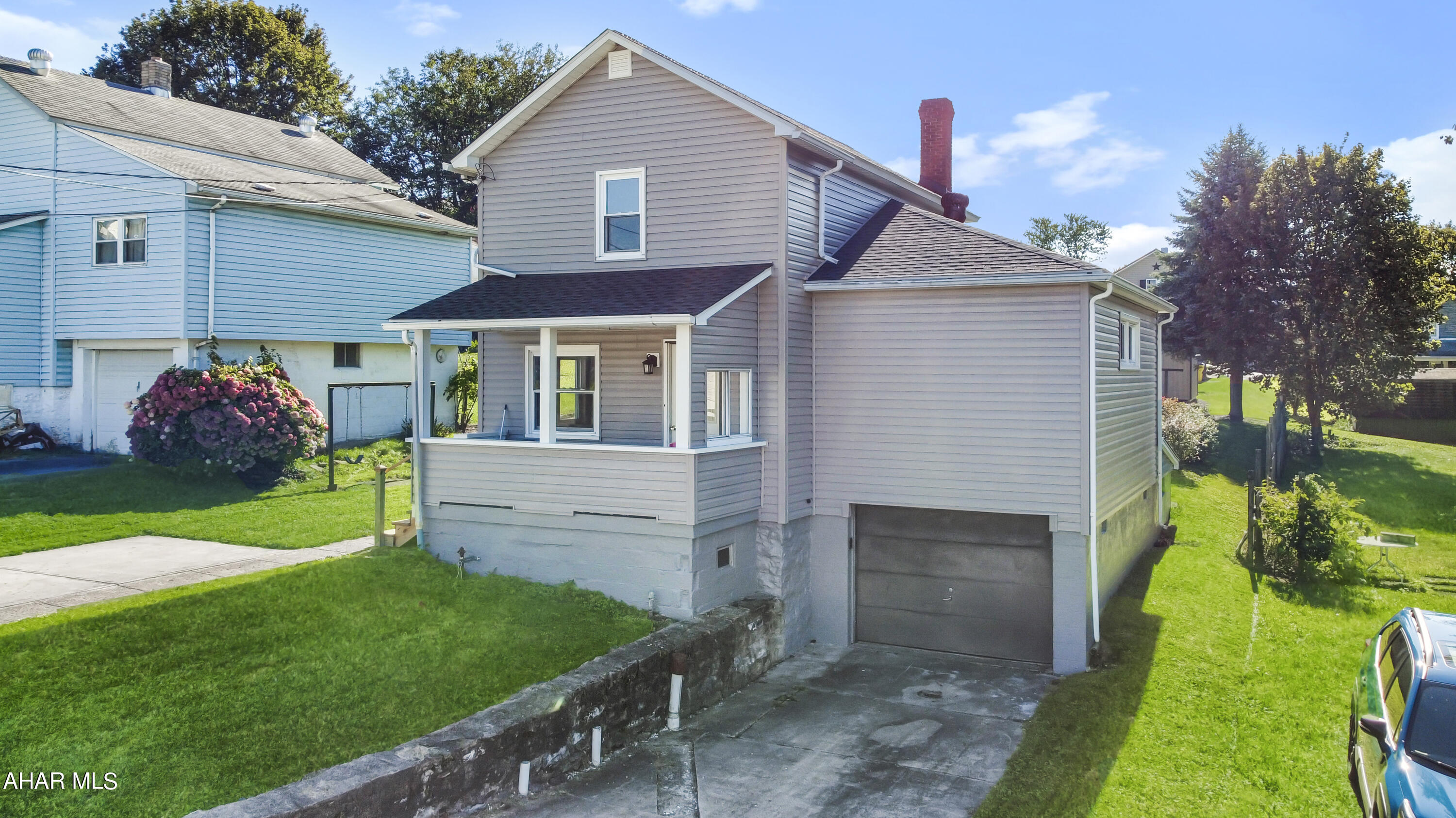 Welcome to 541 5th Street in the Central Cambria School Districts. This beautifully renovated home has undergone a complete transformation. Recent upgrades include a new roof, siding, 200 amp electrical w/ a whole house surge protector, fresh paint, updated fixtures, improved insulation, & new flooring - giving it a fresh and modern look. Step inside & be greeted by a spacious living area adorned w/ hardwood floors. The fully updated kitchen boasts brand new hickory cabinets. Additional highlights of the first floor include a convenient mudroom, a charming sun porch, & a luxurious master bedroom. Upstairs, you'll find a tastefully updated full bathroom & two generously sized bedrooms. The basement, although unfinished, provides excellent storage options & features another full bathroom & a laundry area. Plus, there's an integral 1-car garage for your convenience. Outside, the property showcases a welcoming front covered porch, plenty of off-street parking, a large yard, & a shed w/ electric. Don't miss out on the opportunity to see this remarkable home for yourself. Call today to schedule your private tour and experience the beauty and charm of 541 5th Street.