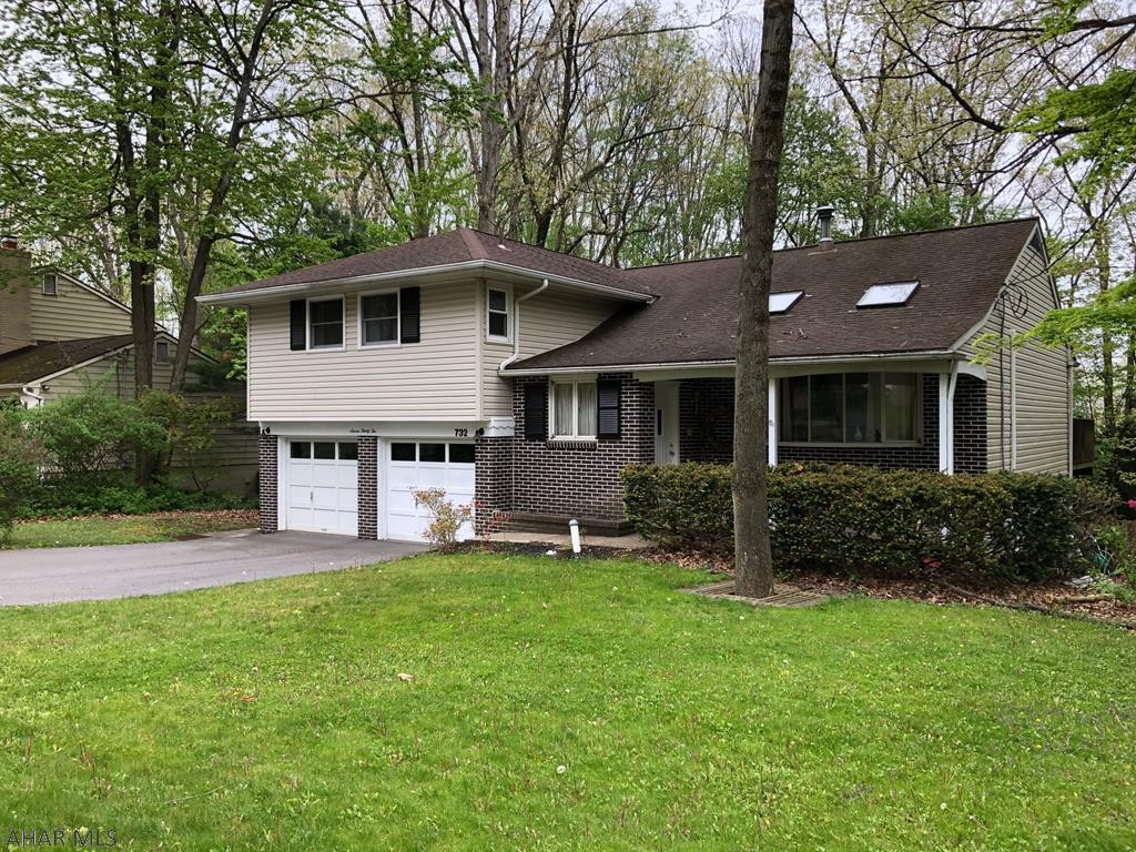 Lots of Space:  Located in Park Forest Village, a family friendly neighborhood, this "Cherry Valley"  styled split level home offers the homeowner lots of usable space.  For starters, from a spacious living room with skylights and ceiling fan to an "in-law" suite with kitchen, bath, bedroom and living room with walk-out  to a covered patio, to a family room with wood burning fireplace, space is what you get.  Three additional bedrooms and two full baths are located on the  upper level.  To the rear of the home si a 24'x12' deck ideal for relaxation and those summer cookouts.  The fenced rear yard is ideal for the safety of a pet or young children.  Close to shopping, entertainment, Penn State University, and downtown State College.