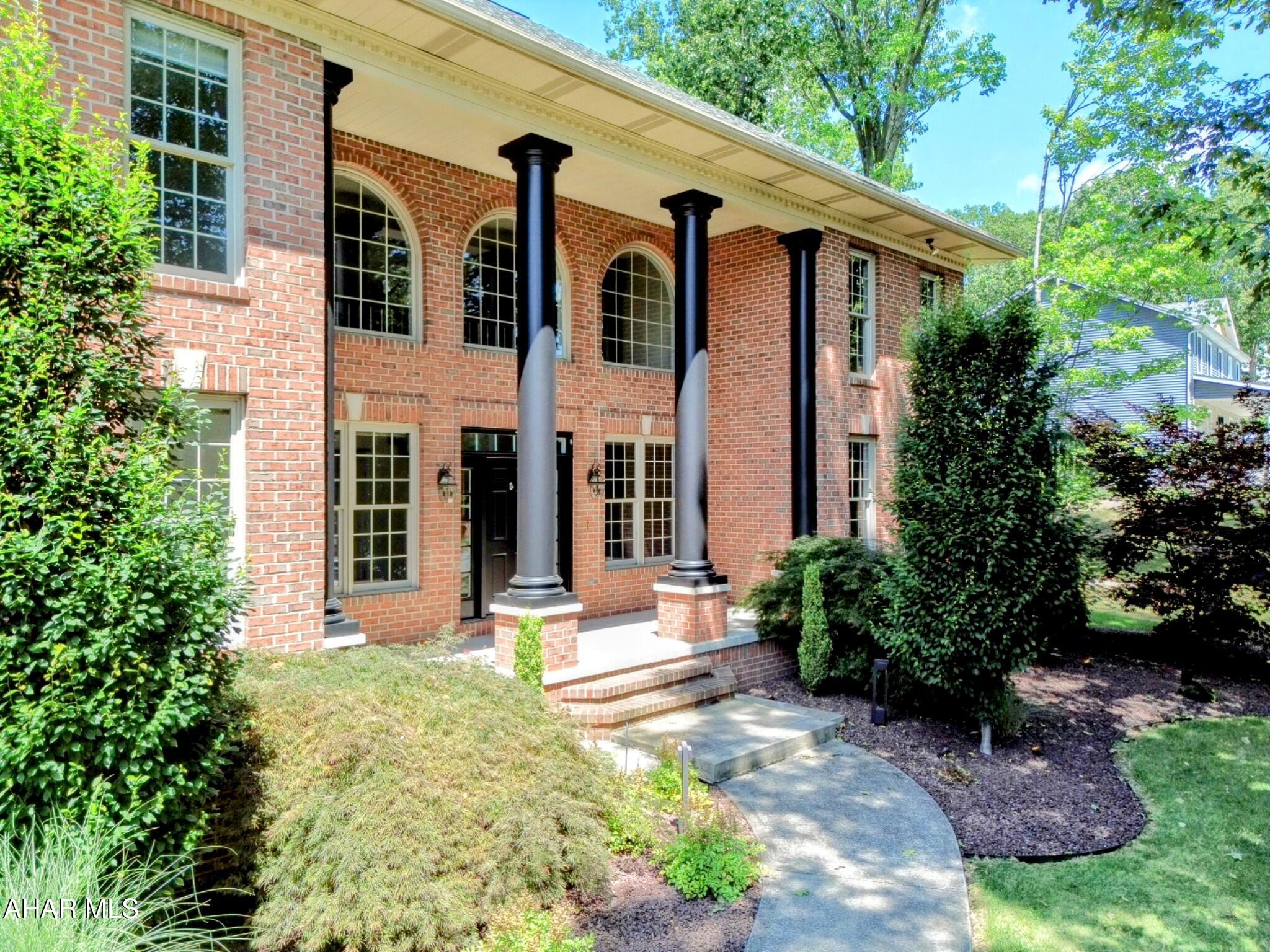 This magnificent residence is a rare expression of architectural excellence.   From the moment you arrive the home commands attention with its striking presence, refined details, and undeniable sense of distinction.  With a new black iron fence surrounding the property, exterior lighting and ornamental trees and shrubs welcoming you as you enter the property.  You are greeted with the grand front entrance, large windows and the stately columns.  The home boasts an elegant curved staircase with large arched windows over looking the front lawn.   It also has a great room with gas fireplace and built in bookshelves. The great room is then open to the kitchen. The kitchen has an island, and spacious area for a table and seating creating an eat-in kitchen. Ample space for all your entertaining needs. Did we mention there is an additional formal dining room, living room, and overflow space in the basement for a movie room, gym, or hangout area? This property has been recently remodeled and freshly painted inside and out. New tile shower in primary bedroom,  updated lighting, new faucets, lever handles all with brushed nickel finish.  Custom designed backyard with wood fire pit and an additional stone fireplace under the covered patio.  The patio has adjustable recessed lighting, ceiling fan,  outdoor tv and built-in seating area. Let's not forget about the custom designed outdoor kitchen and grilling area, with granite counter tops and additional bar seating.  This is a must see home!