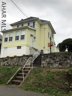 Mint condition, newer remodeled kitchen, enclosed front porch as a sitting room or computer room or excercise room 1 car garage with  new garage doors, see attached list of upgrades in other.  City water and city sewer. Covered Patio. Roof 16 yr old
