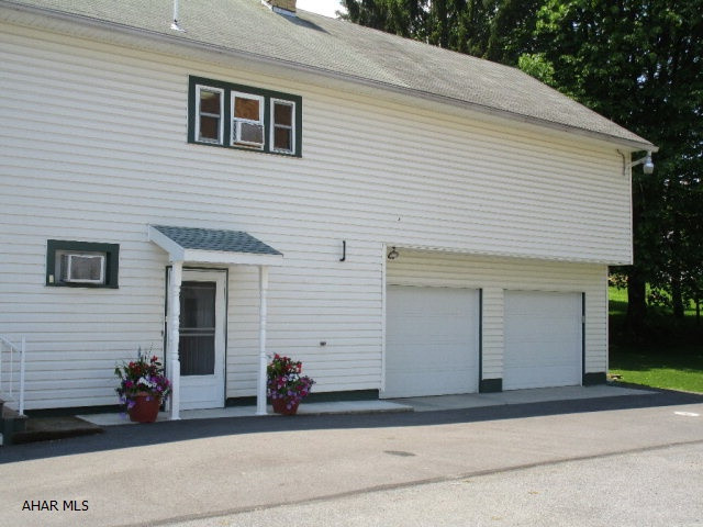 IDEAL FOR MOTHER-IN-LAW SUITE OR INVESTMENT WITH MAIN-LEVEL WIRING FOR FUTURE KITCHENETTE. SELLERS INSTALLING NEW FURNACE IN 6/2016. Heat syst. set up for 4 zones + heats domestic water. Nice 2+-yr.old hickory kitchen; some lovely deco ceilings; abundance of closets; insulated/walk-in attic; 2.5-story addition built on in 1996+-; sealed/heated garage w/fume exhaust fan; exterior RV plug-in; Penelec-1 meter; C.R.A.J.M.A. sewer-1 tap; Fishertown Water Assoc.-1 tap.; 36-diameter drain installed under paved dr.(2+-yrs ago.). Intercom not functioning properly. Drive R/W. Age approx.; SF approx.- includes finish. rms. on main, 2nd, 3rd flrs. Buyer pre-qualification requested prior to showing. VERY CLOSE TO C.R.SCHOOLS!!!