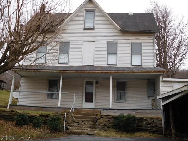 2 bedroom home on corner lot. Has newer oil furnace, newer well pump, 200 amp breaker, thermo pane windows and a possible 3rd bedroom or den, On 0.3078 acres.