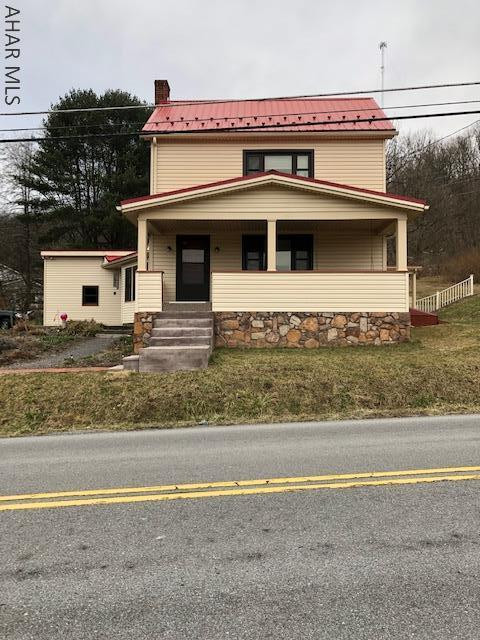 Two story home in the country. 3 Bedroom 1 3/4 bath, living room with hardwood floors. Eat-in kitchen, dining area with hardwood floors, bonus room with fireplace, could make a great den or home office. Two car attached garage. Come summer a beautiful flower garden all on 1.06 acres.
