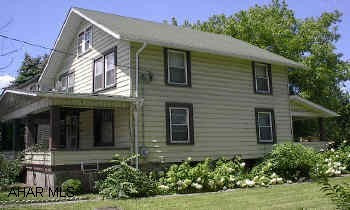 OVER 1/4 ACRE LEVEL LOT.