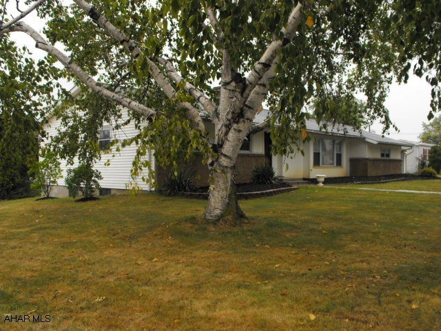 Very large ranch.  Big bright rooms - freshly painted.  New hot water tank and ceramic tile bath.  Large basement with one-car integral garage plus 2-car detached garage.  Screened porch off kitchen.  Should qualify for all loan types.
