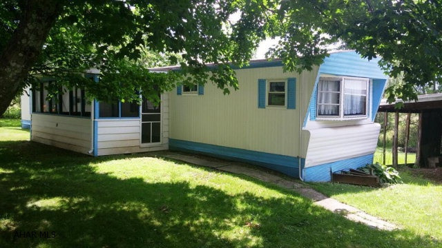 Located in quaint Rainsburg with an exceptional lot, mature trees and stream. 2.5 car garage, 28 x 18 outbuilding. Oil furnace is just 4 years old.