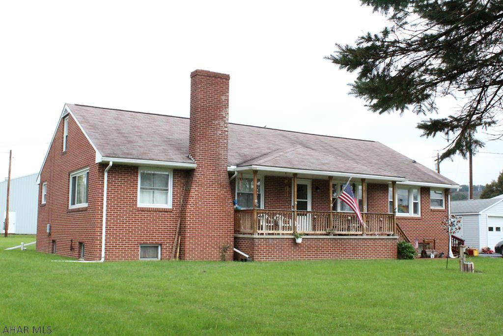 Sturdy built brick house with a level half acre yard and a detached garage. Well maintained with large, spacious rooms and plenty of natural light. Easy access to Bedford, Johnstown and Altoona.