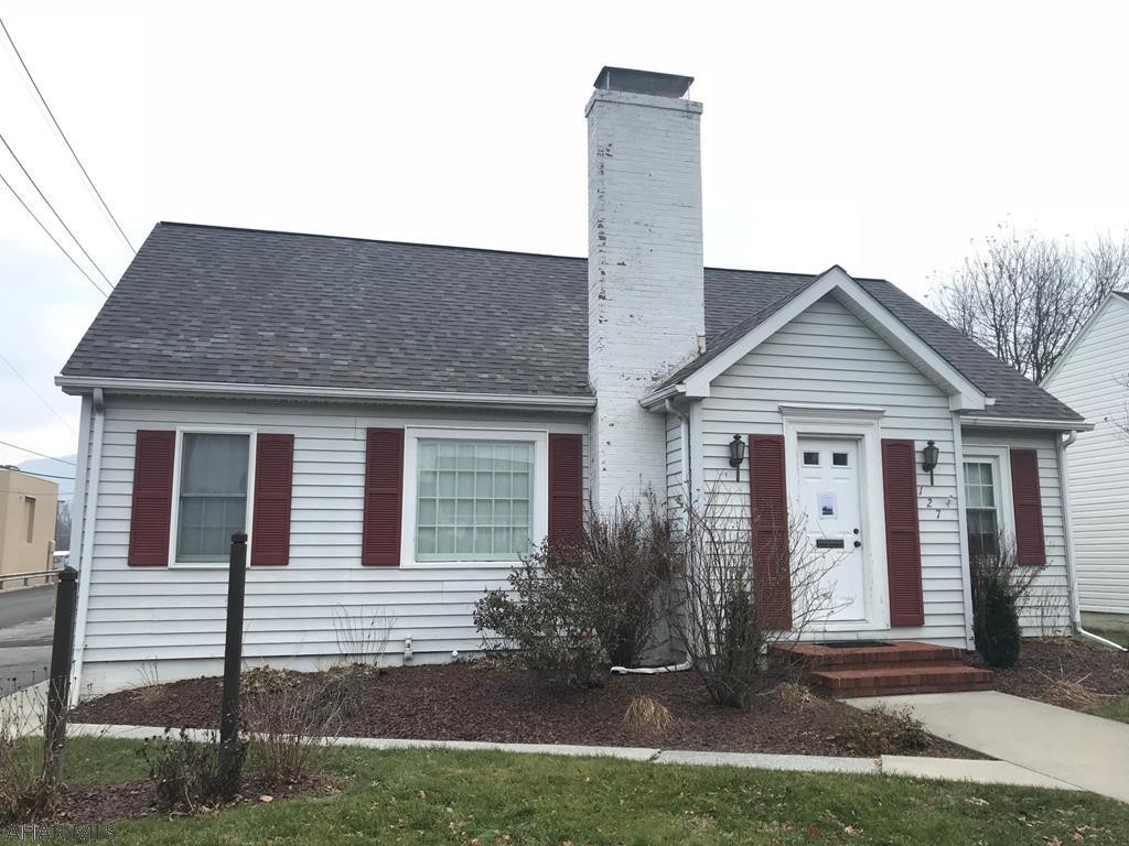 Former State Farm office for ready for lease!  Corner location in the Bedford Borough.  Main level offers three large offices with two entrances, kitchen and a bath.  Second level has a large office area and another small office. $1,000 per month plus utilities.