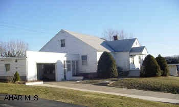 Charming home with family room in basement, breezeway between house and one car attached garage, half bath in basement, covered patio. NO SHOWINGS UNTIL AFTER APRIL 5, 2006.  Lovely one a half story with one bedroom on second story.  Basement has family room, half bath, laundry. Patio. Three window air conditioners.