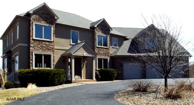 Magnificent Crossman, Castle & Morina open concept home on 6.72 acres with fabulous 360 degree views. Kitchen features double ovens, six burner cooktop, double dishwashers, large wine cooler & granite. Radiant heat except childrens rooms. Office has view of Horseshoe Curve and reservoir. This property has a sauna, a hot tub and a finished basement Total 5,930 sq. feet. 3 car garage.