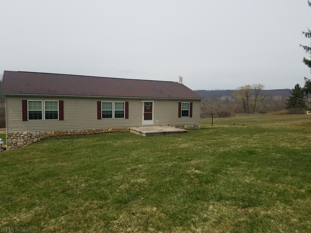 Don't miss this, 3 Bedroom 2 bath home in Hollidaysburg School district, with one owner.  Property sits on 3.35 acres with the ability to do so much! Master bedroom has full bath, laundry on main level. Full unfinished basement is tall enough to be finished for additional living space. Home was placed in 2000 and is a Champion home doublewide, retired title on full foundation. Call listing agent for your showing and more information today!
