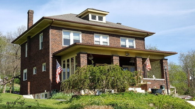 Beautiful, well maintained 3 bedroom, 2 1/2 story brick home located in the heart of Altoona. This property features a beautiful living room with fireplace, dining room and well appointed kitchen (all appliances included). Additionally, you will love the convenience of the first floor bathroom that was recently added.  The second floor features 3 spacious bedrooms with natural woodwork, a full bath and a bonus room that is currently used as a sewing room.  Under the carpets, the home features hardwood floors.  Outside, the property is professionally landscaped, and the front porch, complete with ceiling fans is perfect for entertaining your weekend guests.  Additionally, two additional adjoining lots are included in the the sale of this home, giving the buyer almost an acre of property!