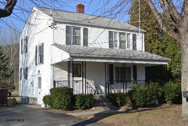 Very cute home on a country setting. New carpet on 1st floor-there's hardwood underneath. 3 bedroom, 1.5 baths, cedar closet. New flooring in kitchen & baths. New sump pump and oak hardwood floors under carpet on 2nd floor. Convenient location. Well maintained.