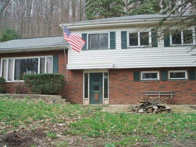 So much potential for this 3 bedroom, 2 bath multi-level. Great location, wooded setting. Needs TLC. Priced to sell, won't last!