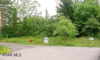 BEAUTIFUL & HANDY 100X200 LOT, WATER/SEWAGE AT STREET-TREED AND LEVEL! BEAUTIFUL AND HANDY 100X200 LOT WITH WATER & SEWAGE IN THE STREET! SOMEWHAT LEVEL AND TREED, SELECT YOUR SETTING-NO ZONING BUT SETBACKS AND PERMITS NEEDED! CALL MIKE MANGIA 932-8888.