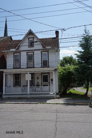 4 Bedroom, 1.5 bath home with spacious living room, kitchen and dining area. Property features off street parking with 3 car detached garage and yard in the borough. Good starter home to add your own personal touches. Original hardwood floors throughout the home.