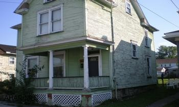 Fixer upper in Williamsburg.Nice 2 car detached garage.  Buyer most pay both transfer taxes.