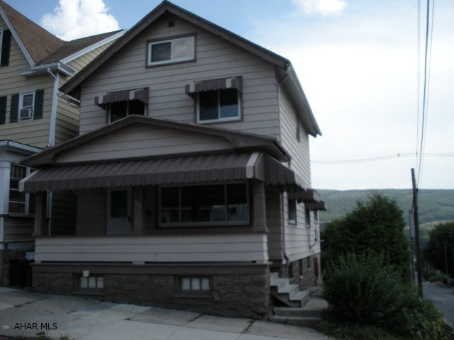 Nicely updated home on corner lot.  3 bedroom, 1.5 bath.  1st floor laundry, new carpet, new interior doors.  Nice eat-in kitchen with ceramic tile counter tops, wood ceiling, appliances included.  New 1st floor 1/2 bath, updated 2 floor bath.  Off street parking, vegetable garden and fish pond.