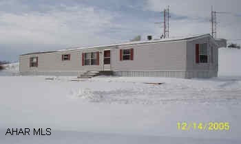1991 COLONG MOBILE HOME ON DEEDED LOT LARGE LOT AT END OF DEAD END STREET