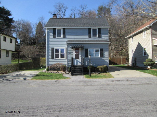 Fantastic home in the Toy town area!  Eat-in kitchen with breakfast bar.  Spacious living room and formal dining room.  Hardwood floors in master bedroom.  Recently updated bathroom.  Basement features a spectacular family room.  New furnace in 2010.  New AC in 2011.  Home sits on a large private lot.  Enjoy plenty of off-street parking with 2 separate driveways.  This home has so much to offer!
