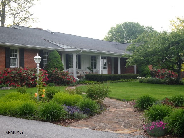 Ebensburg- Immaculate 3 BR, 2   bath brick ranch home on nearly  acre well landscaped lot. Spacious kitchen with corian counter tops. Partially finished basement. Gas FHA heat w/ central air.  2 car attached garage. A must see!