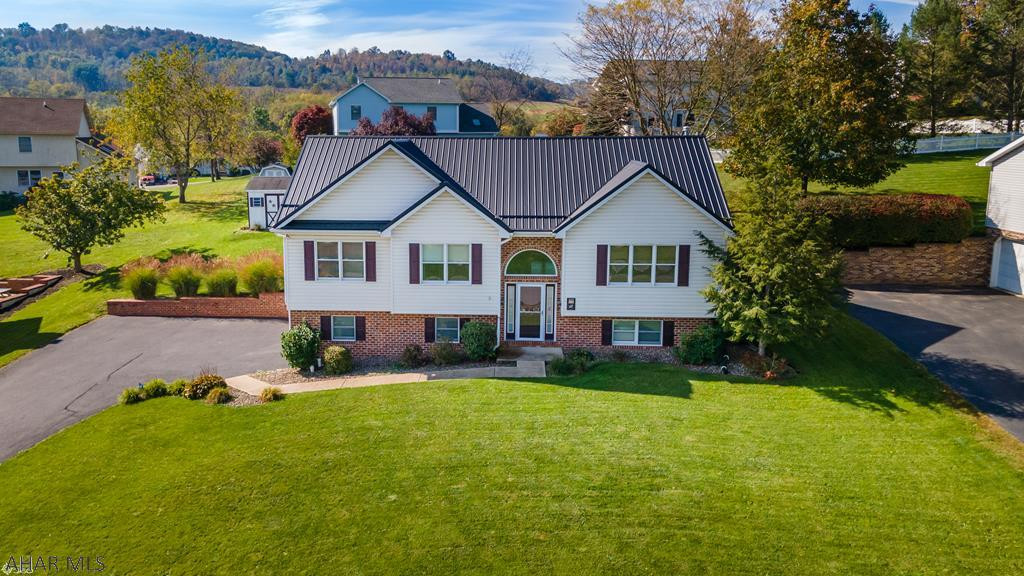 **Penn Farms Prize**  Don't let this lovely home pass by you.  Located on a quiet street in Penn Farms, this home offers an open concept kitchen that has been tastefuly remodeled just a few years ago.  It opens up to a spacious dining room where friends and family can gather.  Cozy up next to the fireplace in the large family room.  Step outside onto the inviting deck to enjoy those cool fall nights.  This home boasts of 4 bedrooms and 3 bathrooms. The lower level bedroom has it's very own gas fireplace, walk-in closet, and ensuite with a jacuzzi tub.   With a new roof, newer heating system, newer french drain system, and a security system, this home is move in ready!  Call today for your tour!  *There is no sign in the yard.  This home is the 7th house on the right.*