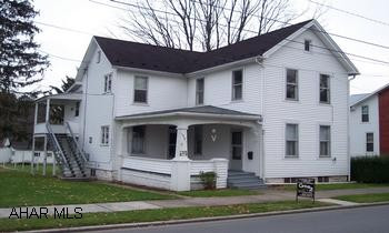 two story duplex  or could be converted back to a single residence.