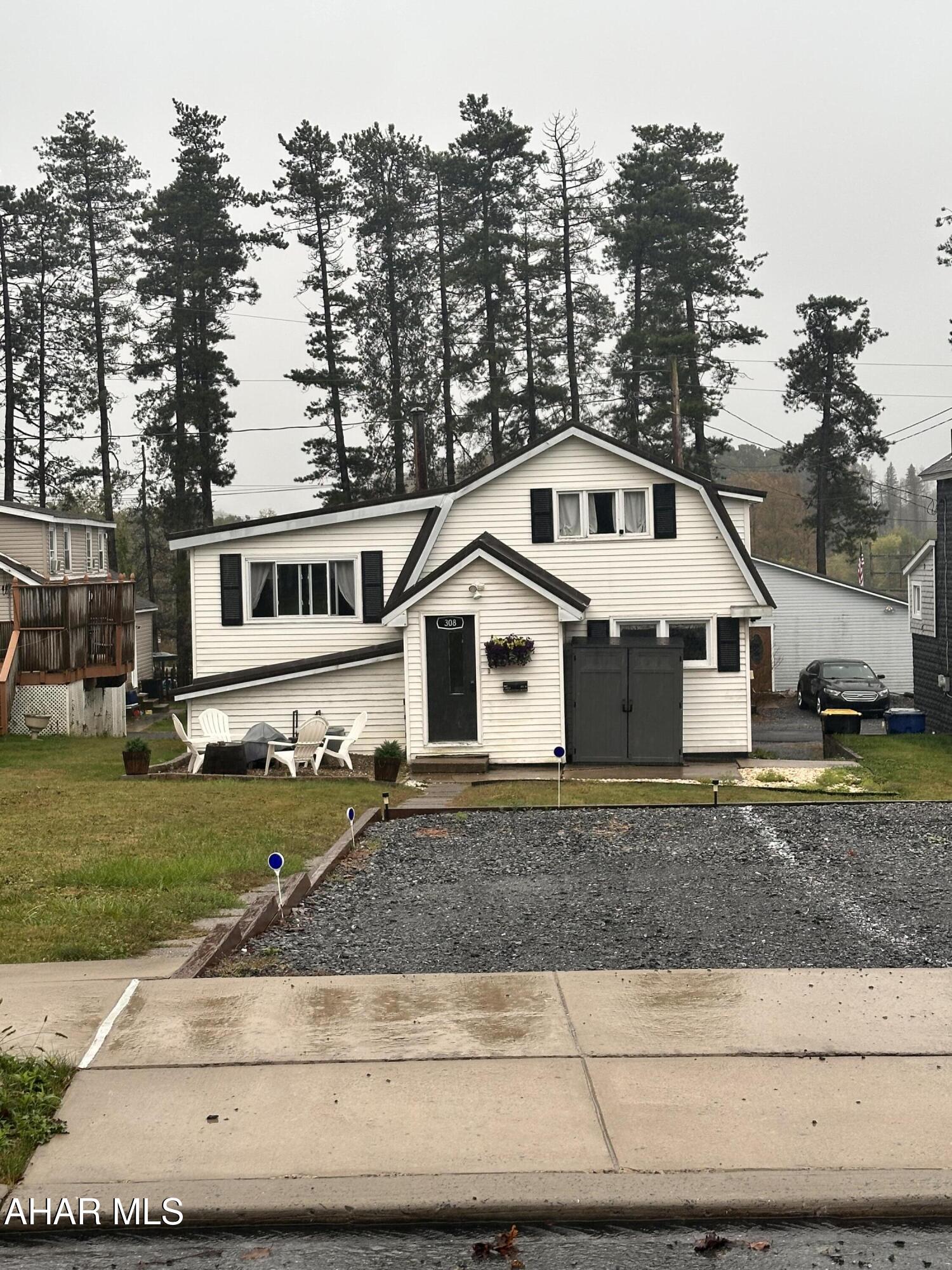 The possibilities are endless for this multilevel home!   This cute home has more space than it looks!  Currently used as an  Air B & B, previously a hair salon, and could be easily converted to a duplex or used as a single family home.